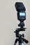 Speedlight gun with trigger set mounted on tripod