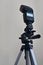 Speedlight gun with trigger set mounted on tripod