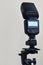 Speedlight gun with trigger set mounted on tripod