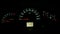 Speedometer of a car dashboard at night auto