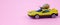 Speedy snail like car racer. Concept of speed and success. Concept of fast taxi or delivery. Yellow car pink background