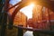 Speicherstadt Hamburg. Famous landmark of old buildings made with red bricks. Bridge and sun rays in low angle view