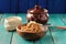 Spelt porridge buttered in wooden bowl and raw spelt in linen ba