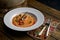 Spelt Pumpkin Mushroom Risotto on Grey Background, Tasty Vegetarian Meal