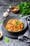 Spelt Pumpkin Mushroom Risotto on Grey Background, Vegetarian Meal