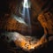 Spelunkers in a colossal cave with light falling from above