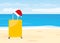 Spending christmas, New Years Eve on the tropical beach, Santa hat on suitcase, winter holiday