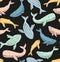 Sperm whale seamless pattern. Colorful whales vector on the black background.