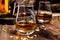 Speyside scotch whisky tasting on old dark wooden vintage table with barley grains
