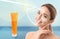 SPF shield and beautiful woman with healthy skin on blurred background. Sun protection cosmetic product