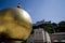 Sphaera, statue of a man on a golden globe on the Kapitelplatz i