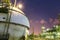 Spheres tank gas with petrochemical column tower background