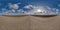 spherical 360 hdri panorama on gravel road with clouds on blue sky with halo in equirectangular seamless projection, use as sky