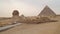 Sphinx on the background of the Hefren pyramid
