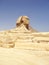 The Sphinx in Egypt. Mysterious ancient landscape. Historical heritage. Side view. Cairo, Egypt