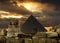 The Sphinx and the pyramid of Cheops in Giza Egipt at sunset