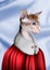 Sphynx cat dressed like royal person against light blue background