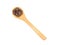 Spice allspice in wooden spoon isolated