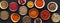 Spice background. Colourful seasonings in bowls, top view