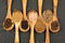 Spice and Food - Background made of various spices in cooking spoons made of olive wood