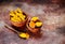 Spice turmeric powder and turmeric root in bowls