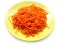 Spiced carrot in green plate