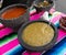 Spiced red tomato salsa and spiced green salsa for seasoning traditional Mexican food