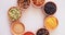 Spices, curry powder and bowls for seasoning, seeds and studio for herbs, top view and condiments. Food, natural and