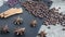 Spices and food on wooden background. Cinnamon sticks, star anise and coffee beans. Ingredients for home cooking