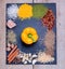 Spices, herbs and fresh yellow pepper on slate tray on an old rustic table. Top view. Rustic style. Fresh ingredients.