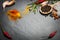 Spices and herbs over black stone background