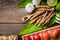 Spices and herbs over wooden background