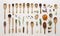 spices and herbs in wooden spoons on white background, flat lay