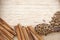 Spices scattered on wooden plate