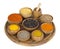 Spices and seasoning in wooden bowl on white background