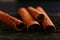 Spices sticks cinnamon on the old table. Rustic background, aroma close-up