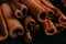 Spices sticks cinnamon on the old table. Rustic background, aroma close-up