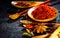 Spices. Various Indian spices on black stone table. Spice and herbs on slate background