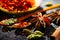 Spices. Various Indian spices on black stone table. Spice and herbs on slate background