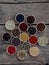 Spices on a wooden background. Coriander, black pepper, paprika, mustard, turmeric, cumin, sumac, fenugreek, cloves, cubeb.