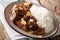 spicy beef salpicao with garlic and rice closeup on a table. horizontal