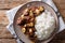 spicy beef salpicao with garlic and rice closeup on a table. Horizontal top view