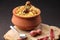 Spicy chicken biryani in traditional handi or clay pot.