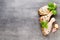 Spicy chicken legs, fresh vegetables on a gray background.Top view