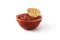 Spicy chili sauce in bowl with nacho chip