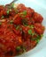 Spicy Chinese Manchurian with coriander sprinkled over it.