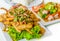 Spicy deep fried squid mingle serve with broccoli prawn salad. A