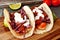 Spicy fish tacos with cabbage slaw, salsa and sour cream