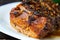 Spicy fried brisket with interlayers of pork lard baked with herbs, close-up selective focus