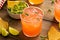 Spicy grapefruit margarita with chips and guacamole